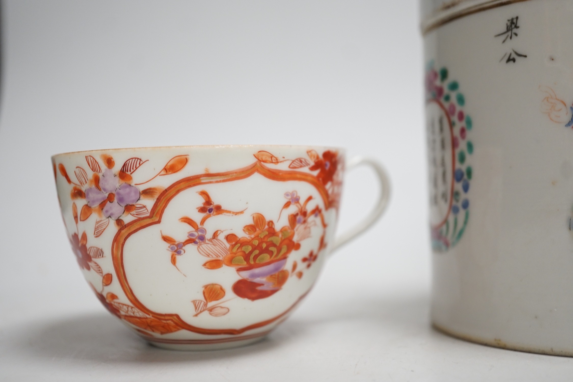 A 19th century Chinese famille rose cylindrical jar and cover, 11.5cm high, a blue and white prunus lamp and a Japanese eggshell porcelain cup